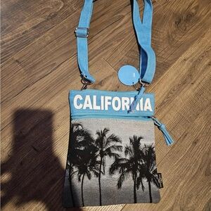 Robin Ruth Black and Blue Bag with Logo Charm